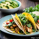 Home 20 퓨전 패스트푸드의 저칼로리 옵션 - A vibrant fusion dish featuring teriyaki chicken tacos topped with fresh arugula and sliced avocado,...